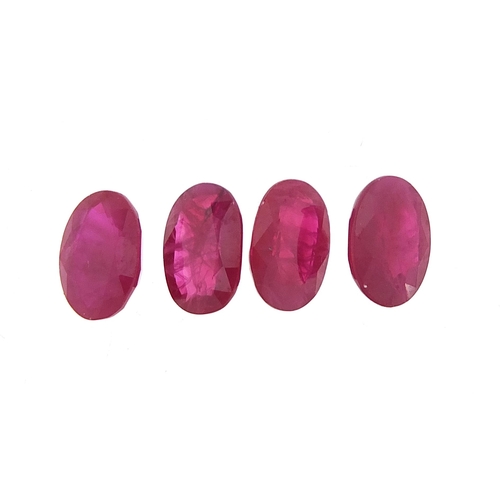 1127 - Four ruby gemstones, each 7mm x 5mm