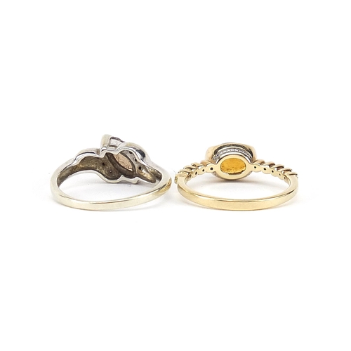 809 - Two 9ct gold rings comprising smoky quartz with diamond shoulders and citrine with diamond shoulders... 