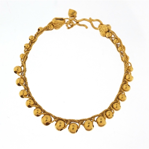 752 - Unmarked high carat gold bracelet, (tests as 18ct +), the vendor was informed this is pure gold on p... 