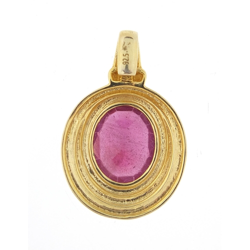 1033 - Silver gilt ruby pendant, approximately 7.8 carat, 3.5cm high, 7.2g