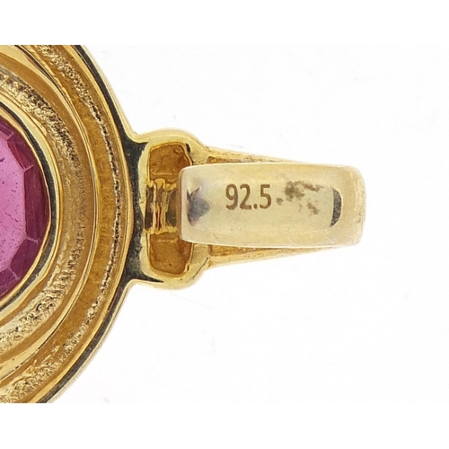 1033 - Silver gilt ruby pendant, approximately 7.8 carat, 3.5cm high, 7.2g