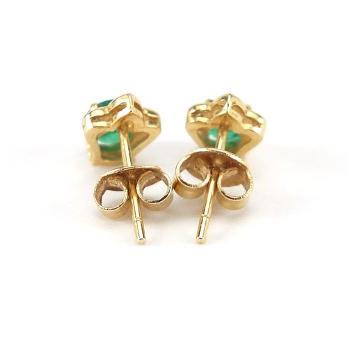 856 - Pair of 18ct gold emerald and diamond stud earrings, 8mm high, 1.5g