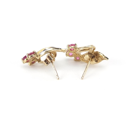 762 - Pair of 9ct gold ruby and diamond stud earrings, 1.6cm high, 1.6g