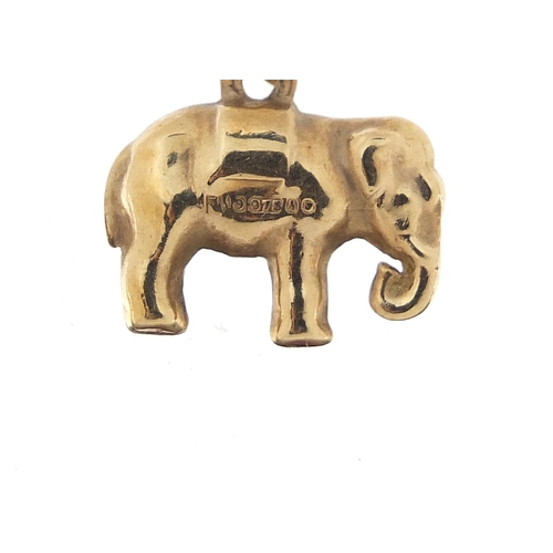 947 - 9ct gold elephant charm, 1.4cm in length, 0.7g