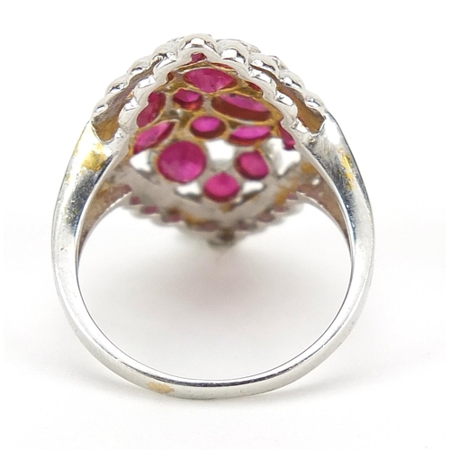 1169 - 18ct gold ruby cocktail ring, size J, 4.0g