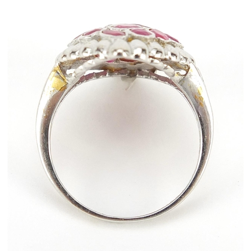 1169 - 18ct gold ruby cocktail ring, size J, 4.0g