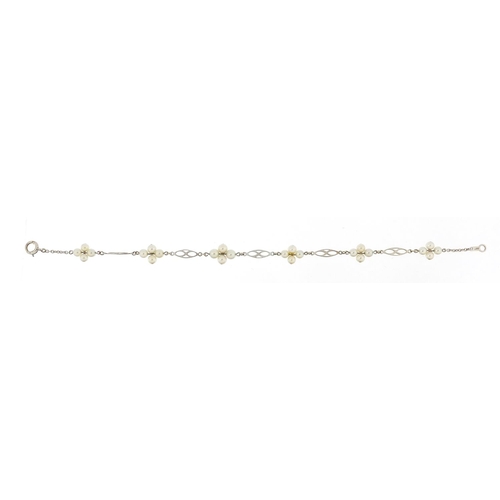 808 - 9ct white gold pearl bracelet housed in an R S Harrison & Son fitted box, 18cm in length, 3.0g