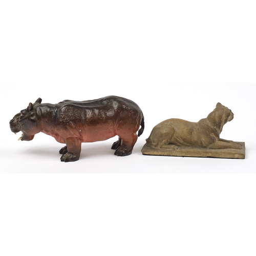 1268 - Continental porcelain hippopotamus and an Art Deco lioness, the largest 35.5cm in length