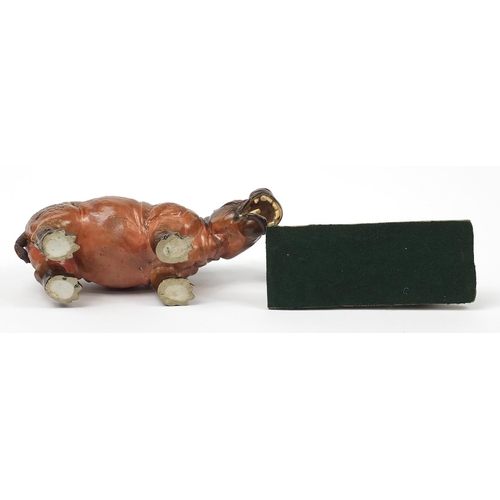 1268 - Continental porcelain hippopotamus and an Art Deco lioness, the largest 35.5cm in length