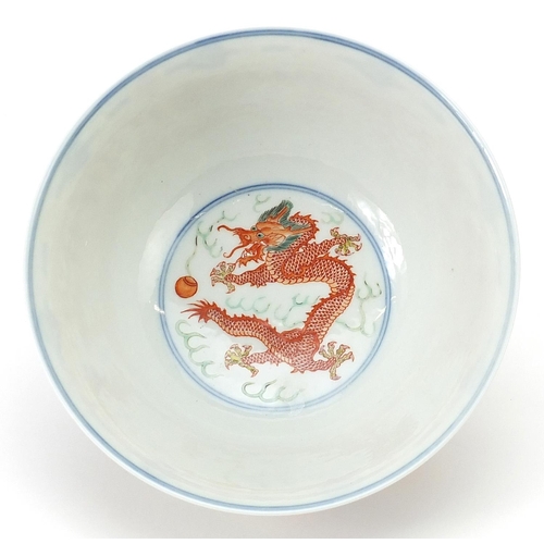 89 - Chinese doucai porcelain bowl finely hand painted with phoenixes and dragons amongst flowers, six fi... 