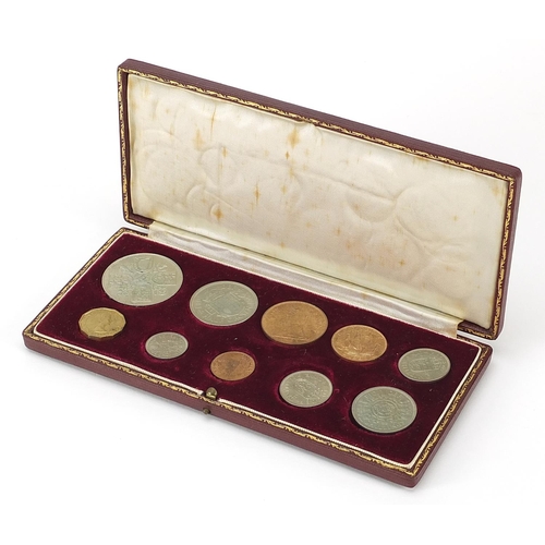 320 - Elizabeth II 1953 specimen coin set housed in a velvet lined tooled leather case, 20cm wide