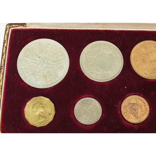 320 - Elizabeth II 1953 specimen coin set housed in a velvet lined tooled leather case, 20cm wide