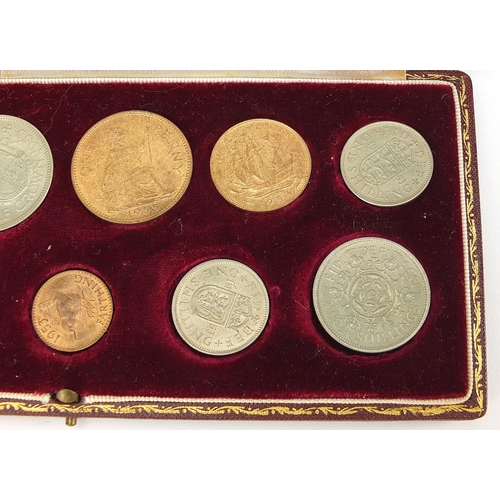 320 - Elizabeth II 1953 specimen coin set housed in a velvet lined tooled leather case, 20cm wide