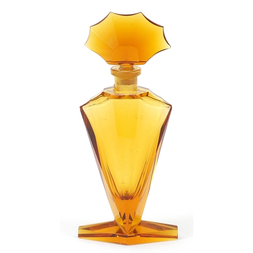 426 - Large Art Deco amber glass scent bottle with fan design stopper, 17cm high