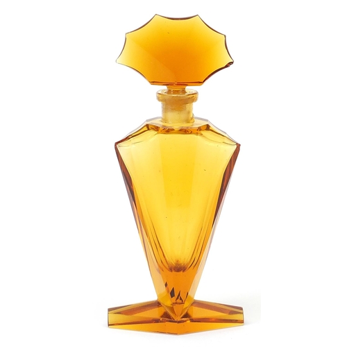 426 - Large Art Deco amber glass scent bottle with fan design stopper, 17cm high