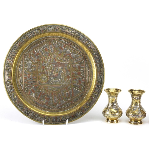 219 - Islamic brass Cairoware with silver inlay comprising coffee pot, six cups on tray and pair of vases,... 