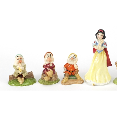 491 - Royal Doulton Snow White and the Seven Dwarfs, the largest 15cm high