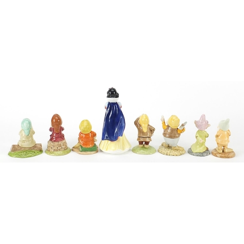 491 - Royal Doulton Snow White and the Seven Dwarfs, the largest 15cm high