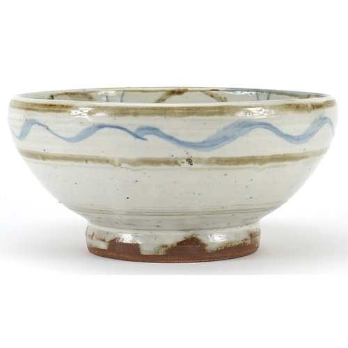 82 - Ara Cardew studio pottery footed bowl and plate hand painted with a stylised bird, the largest 25.5c... 