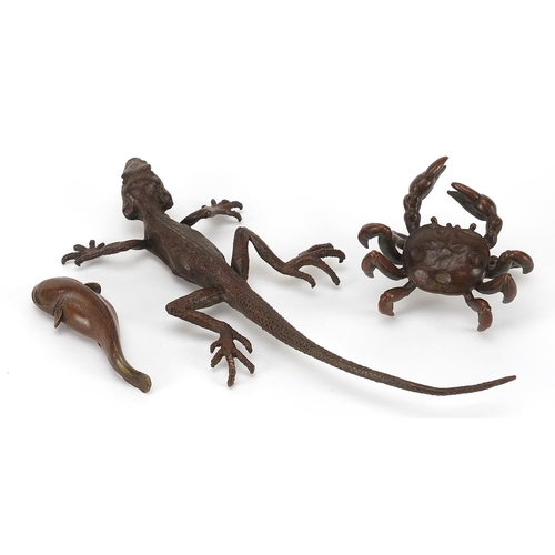 480 - Three Japanese patinated bronze animals comprising lizard, crab and catfish, each with character mar... 