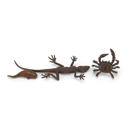 480 - Three Japanese patinated bronze animals comprising lizard, crab and catfish, each with character mar... 