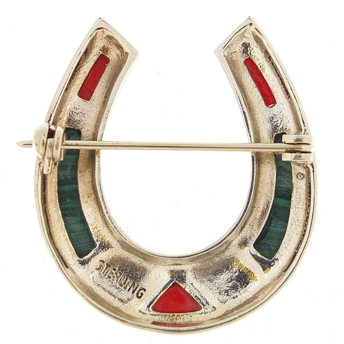 1138 - Sterling silver horseshoe brooch set with malachite and coral coloured stones, 3.5cm high, 9.5g