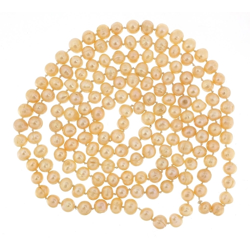 1144 - Large pink freshwater pearl necklace, 130cm in length, 89.8g