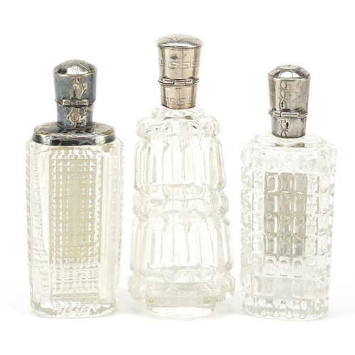 68 - Three Dutch silver mounted cut glass scent bottles, the largest 9.5cm high