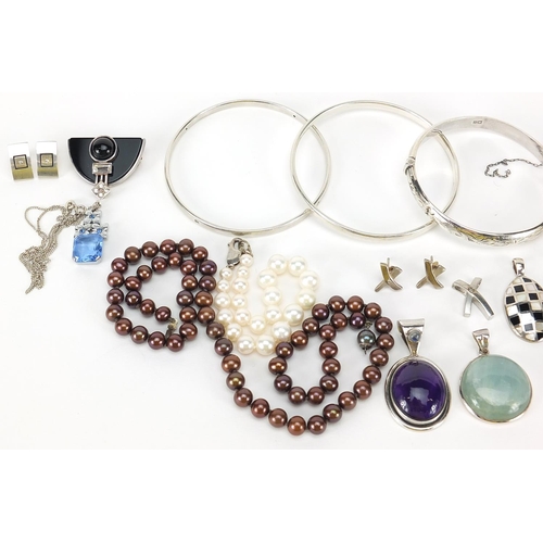 1104 - Silver jewellery set with semi precious stones, some Art Deco design including earrings, pendants, b... 