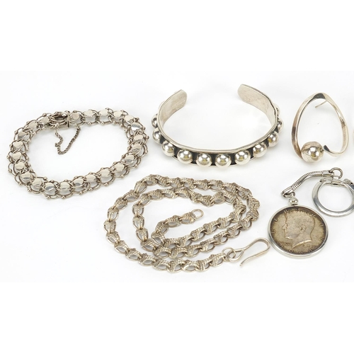 1105 - Silver jewellery including Mexican bangle, filigree earrings and a love heart bracelet, 109.0g