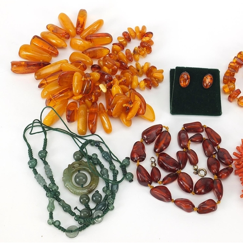 1172 - Assorted jewellery comprising three natural and Baltic amber necklaces, pair of silver and amber ear... 