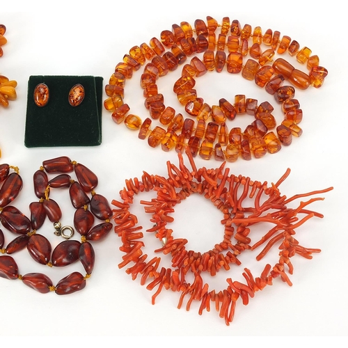 1172 - Assorted jewellery comprising three natural and Baltic amber necklaces, pair of silver and amber ear... 