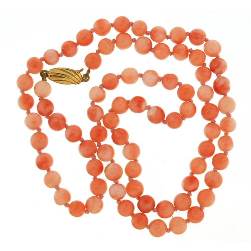 857 - Pink coral bead necklace with 9ct gold clasp, 52cm in length, 22.5g