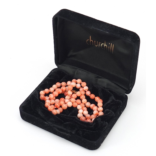 857 - Pink coral bead necklace with 9ct gold clasp, 52cm in length, 22.5g