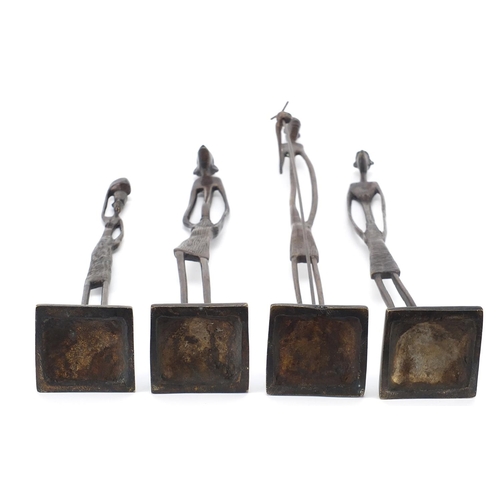 482 - Four Modernist patinated bronze studies of African tribes people, the largest 51cm high