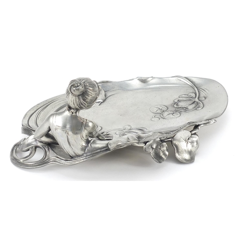 1225 - WMF style pewter card tray in the form of a maiden beside a lily pad, 25.5cm wide