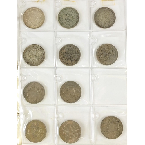 311 - 19th century and later British and world coinage arranged in an album, mostly silver including four ... 