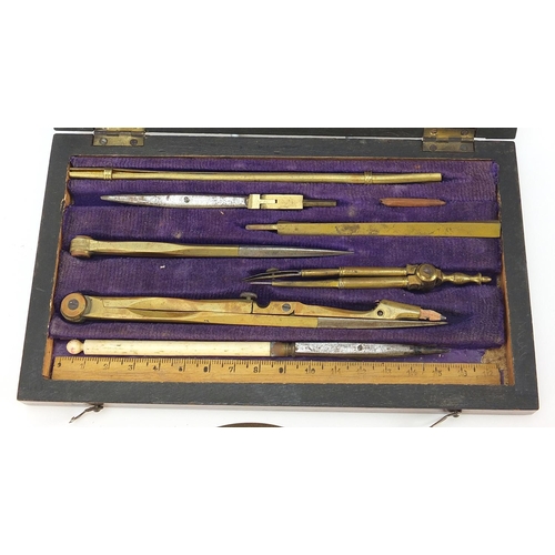 376 - Early 19th century rosewood drawing set with implements including two protractors, 20cm wide