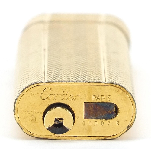 441 - Cartier gold plated pocket lighter, 7cm high