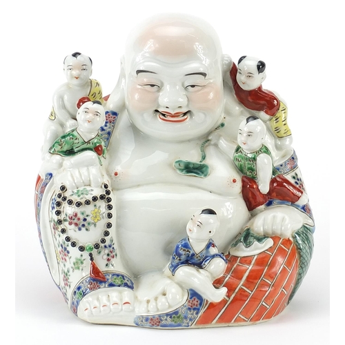 20 - Chinese porcelain figure of Buddha with children, impressed character marks to the base, 25cm high