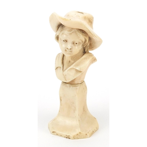 65 - 19th century carved ivory bust of a boy wearing a sunhat, 12cm high