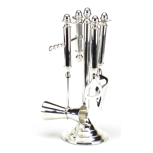 1228 - Novelty silver plated bar companion set including corkscrew and bottle opener, 28cm high