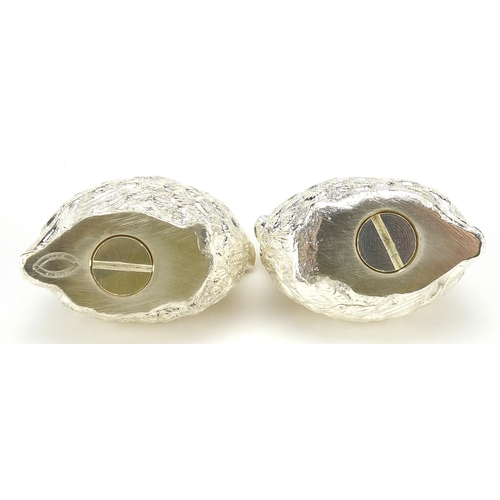 1365 - Two silver plated quail casters, 6cm in length