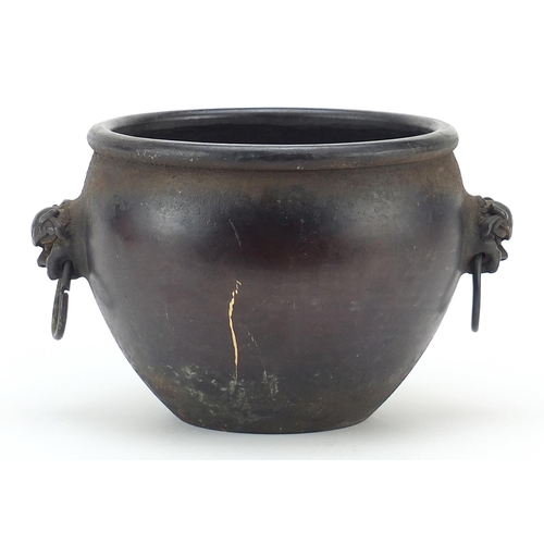 449 - Chinese patinated bronze censer with dog of Foo head and ring handles, 13.5cm high