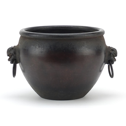 449 - Chinese patinated bronze censer with dog of Foo head and ring handles, 13.5cm high