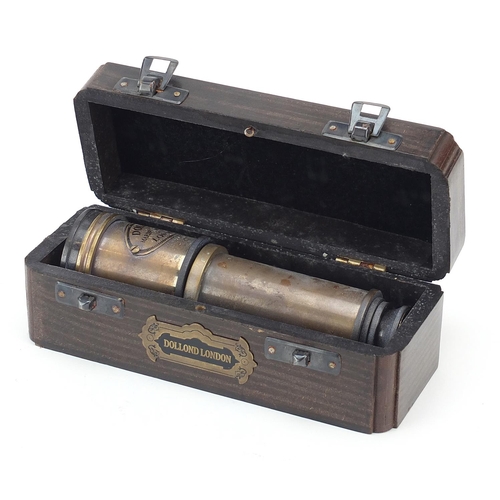 1303 - Naval interest marine three draw brass telescope with hardwood case, 14.5cm in length when closed