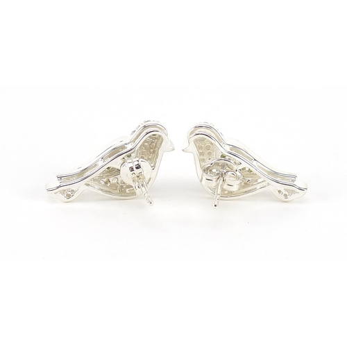 1093 - Pair of sterling silver green and white diamond bird earrings with certificate, approximately 0.75 c... 