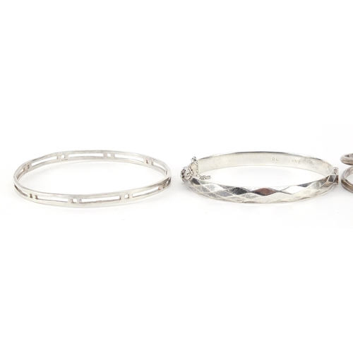 1085 - Four silver bangles including one Rennie Macintosh design, 56.7g