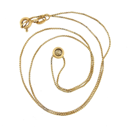 811 - Unmarked gold diamond solitaire pendant on an 18ct gold necklace, 5mm in diameter and 38cm in length... 