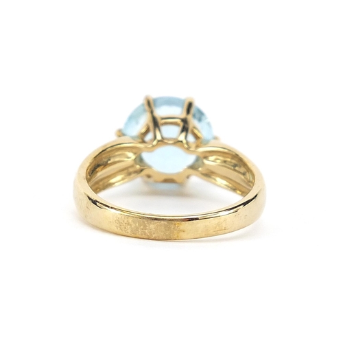 841 - 9ct gold blue topaz solitaire ring, 10mm in diameter, size N, 4.2g